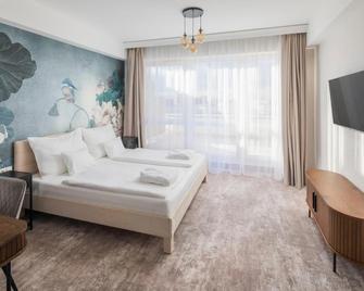 Hotel Atlantis Wellness & Conference - Hajdúszoboszló - Bedroom