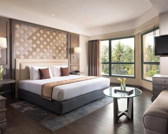 Melia Purosani Yogyakarta - Yogyakarta - Bedroom