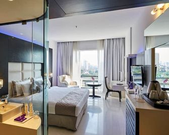 Eskay Resorts - Mumbai - Soveværelse