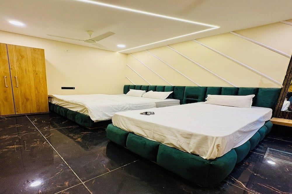 Hotel Naagshree - אויאיין - חדר שינה