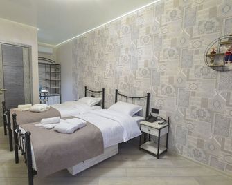 هوتيسي هوتل - تبليسي - غرفة نوم