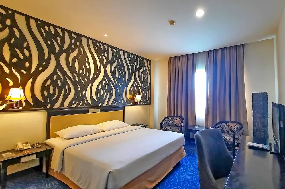 Plaza Inn - Kendari - Schlafzimmer