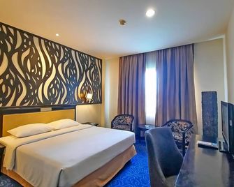 Plaza Inn - Kendari - Schlafzimmer
