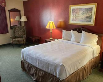 The Jeffreys Hotel Extended Stay - Osceola - Ložnice