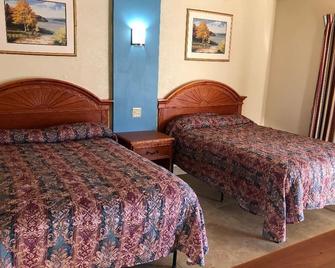 American Inn of Daytona - Daytona Beach - Bedroom