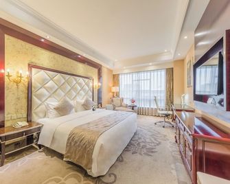 سوفيس جينيوان هوتل - تشنغدو - غرفة نوم