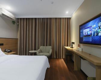 Greentree Inn Shangqiu Normal College Wenhua(W)road Business Hotel West Road Branch - Shangqiu - Bedroom