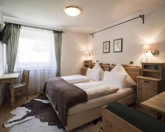 Alpstay - Chalet Hotel Hartmann - Adults Only - אורטיסיי - חדר שינה