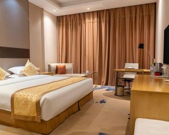 Fusheng Hotel (Qingdao Huangdao) - Qingdao - Bedroom