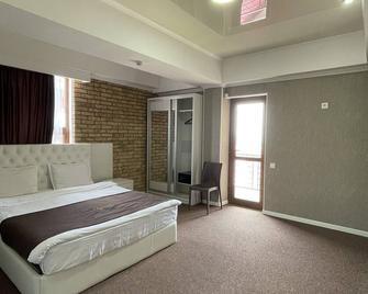 Vzmorie Deluxe Hotel - Bosteri - Habitación