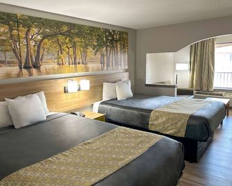 Days Inn & Suites by Wyndham Opelousas - Opelousas - Slaapkamer