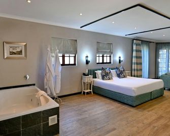 Anew Resort Wilderness Garden Route - George - Schlafzimmer