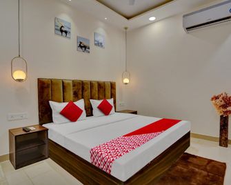 Hotel O Orchid - Ludhiana - Schlafzimmer