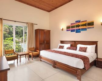 Hotel Cassendra - Kandy - Schlafzimmer