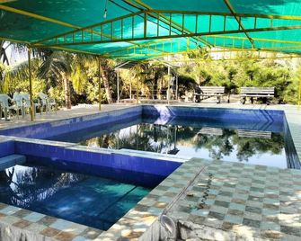 Jvl Resort By Nexottel - Dhāri - Piscina