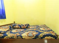 Dharmawati Homestay - Gedangan - Schlafzimmer