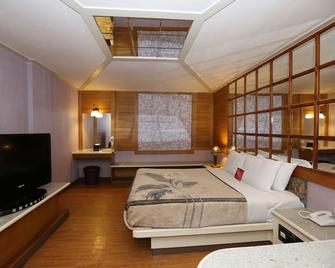 Midi Motel Tainan Branch - Tainan City - Bedroom