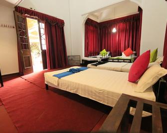 Singgah - קאנדי - חדר שינה