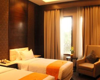 Sheo Resort Hotel - Bandung - Slaapkamer