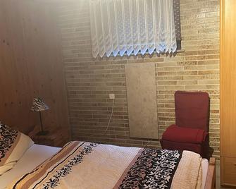 Souterrainwohnung Zum Leiselsee - Baunatal - Schlafzimmer