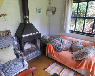 For rent comfortable Chalet in Gonçalves / MG - Gonçalves - Вітальня