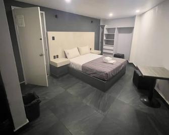 هوتل أكواريو سي دي إم إكس - سنترال ديل نورتي - مكسيكو ستي - غرفة نوم