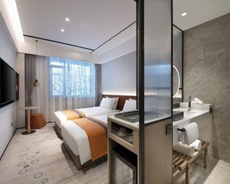 Datang Phoenix Park Business Hotel - Tangshan - Slaapkamer