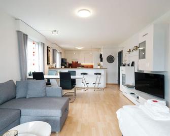 Apartment Panoramablick - Amden - Вітальня