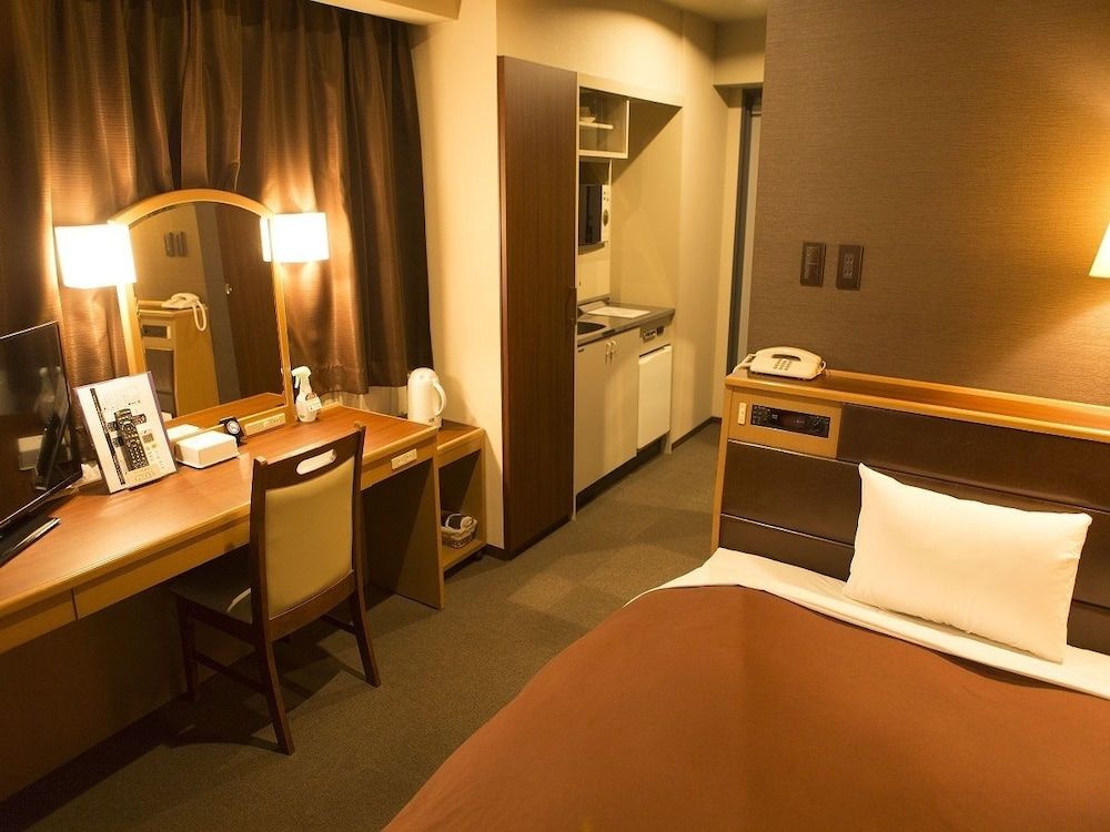 Nissin Namba Inn - Ōsaka - Schlafzimmer