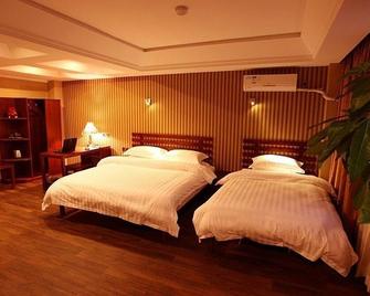Epro Business Hotel - ยานไถ - ห้องนอน