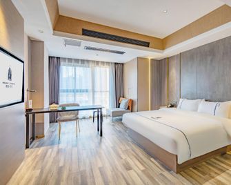 Memory Graceful Hotel(Changzhou Yancheng Wuyue Plaza) - Changzhou - Slaapkamer