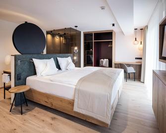 Hotel Baumwirt - 卡斯特爾羅托 - 臥室
