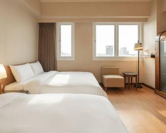 كايندنيس هوتل وو جيا - مدينة كاوهسيونغ - غرفة نوم