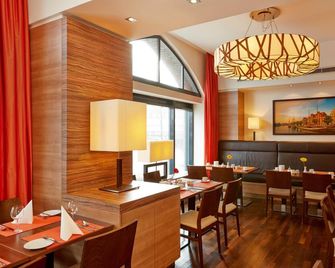 H+ Hotel Lübeck - Lübeck - Restaurang