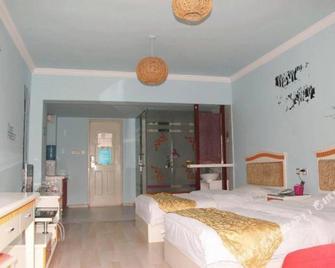 Yongxing Hotel - Chuxiong - Habitación