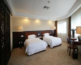 Tianan Rega Hotel - Beijing - Bedroom