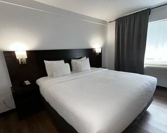 Hotel Newstar - Montréal - Camera da letto