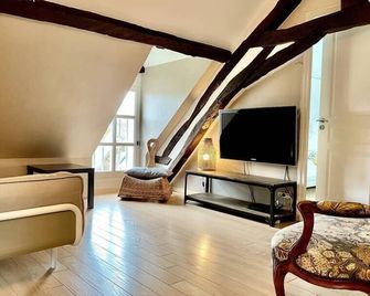 Gites-domainedupin, gîte de la Closerie - Mosnes - Living room