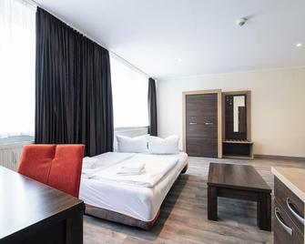 home Hotel - Wilhelmshaven - Bedroom