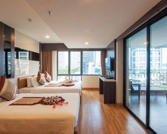 Golden Jomtien Beach Hotel - Jomtien - Ložnice