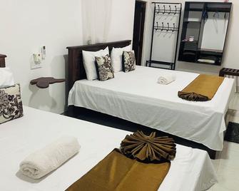 Sigiri Suncap Cottage - Sigiriya - Habitación