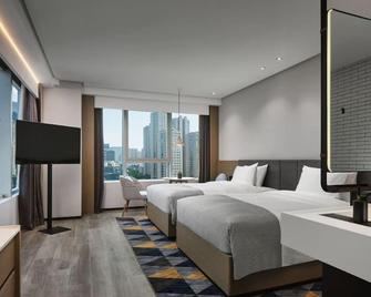 Ningbo Wanda Moments Hotel - Ningbo - Ložnice