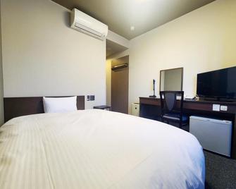 Hotel Route-Inn Court Kofu Isawa - Fuefuki - Slaapkamer