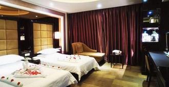 Huangtai International Hotel - Jinan - Schlafzimmer
