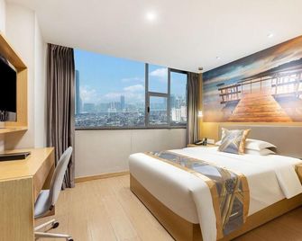 Ganzhou Ganlong Hotel (Nanmenkou Yugutai Branch) - Ganzhou - Bedroom