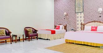 Capital O 90417 Hotel Batu Suli Internasional - Palangkaraya - Bedroom