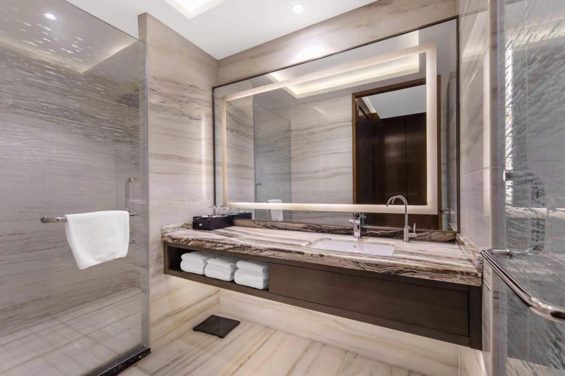 Zhenbao Holiday Hotel (Nanjing Olympic Sports Center) - נאנז'ינג - חדר שינה