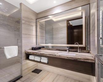 Zhenbao Holiday Hotel (Nanjing Olympic Sports Center) - Nankín - Habitación