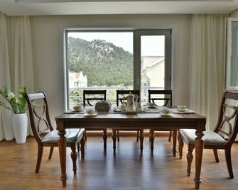 كينج داو أوشن سايد هوتل أند ريزورت - تشينغداو - غرفة طعام