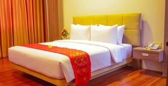 Airish Hotel - Palembang - Bedroom
